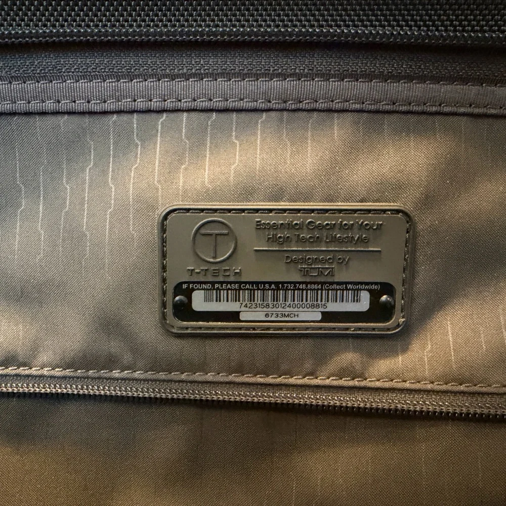 Tumi Brown Backpack with Multiple Compartments